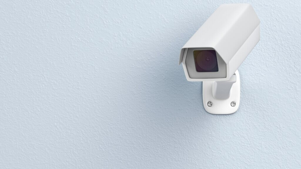 Airbnb surveillance camera on a white wall