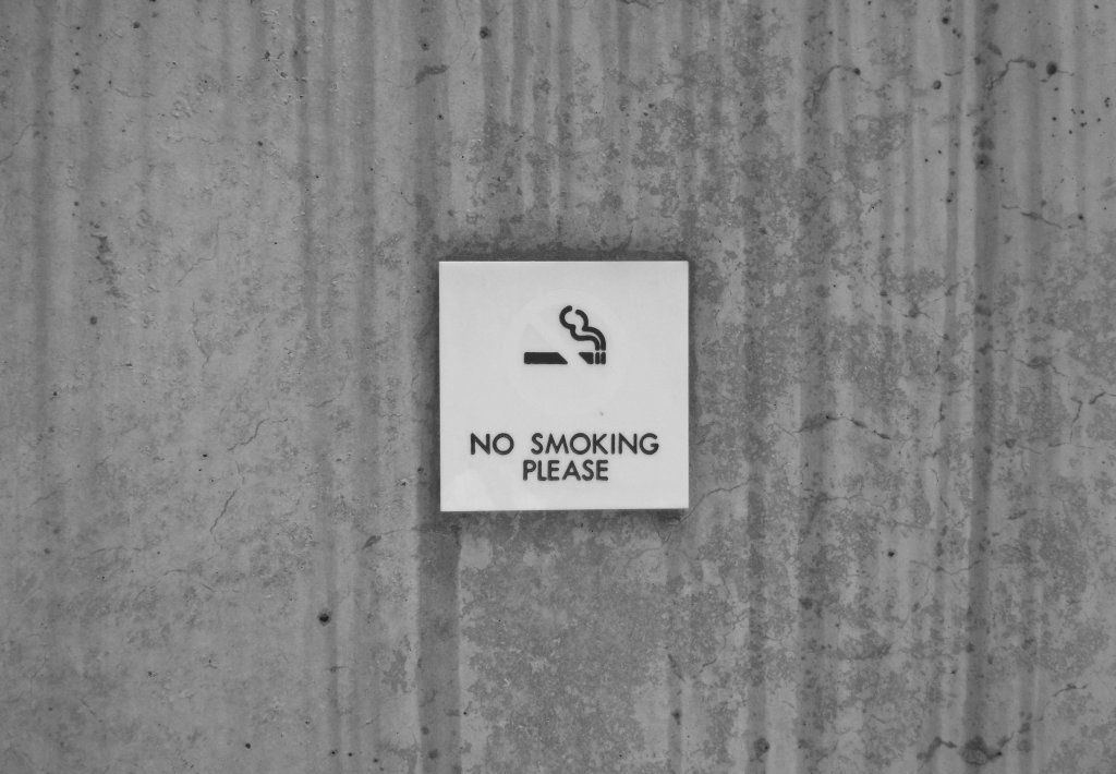 No smoking sign. Prohibit indoor smoking for your rental home. Photo by Franck V. on Unsplash