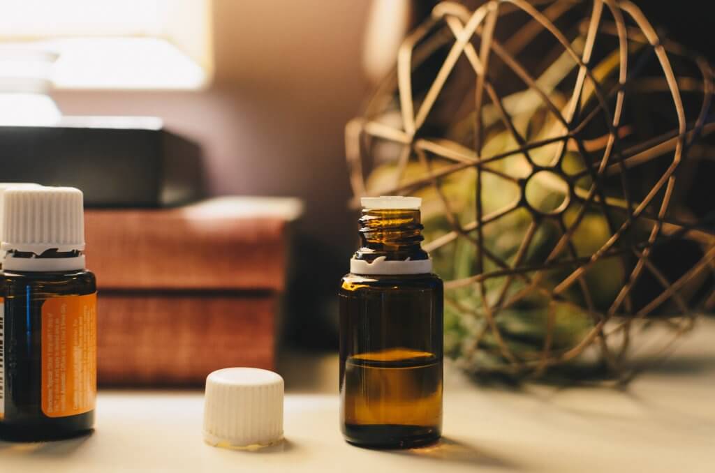 Essential oils for homemade all-purpose cleaner. Photo by Kelly Sikkema on Unsplash.