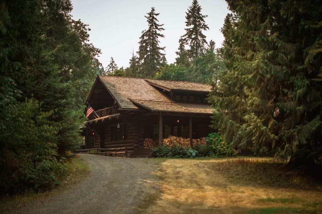 Woodland cabin. Photo by Roberto Nickson on Unsplash.