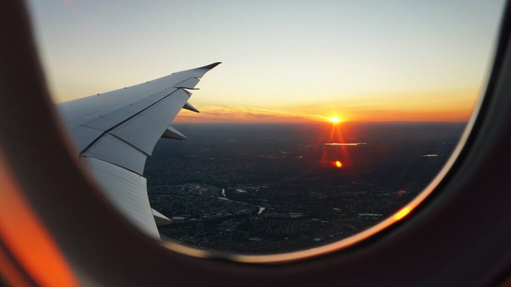 Sunset seen from a plane by Eva Darron