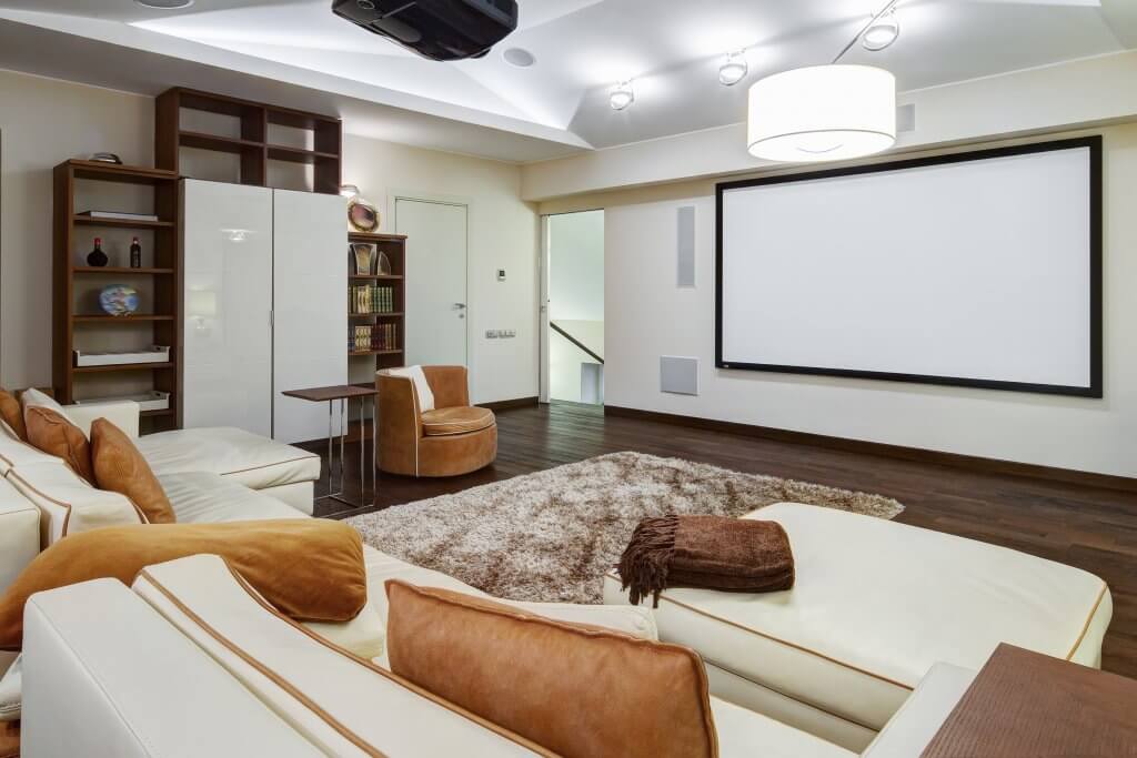 Adding a home theater can instantly up the value of your vacation rental property.
