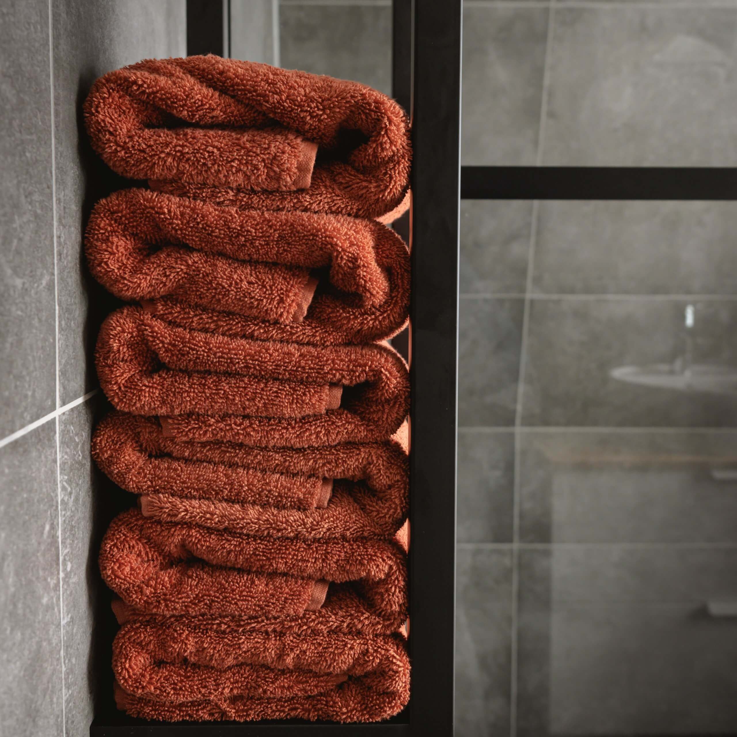 Well-presented towels can be great accent pieces for a bathroom. 