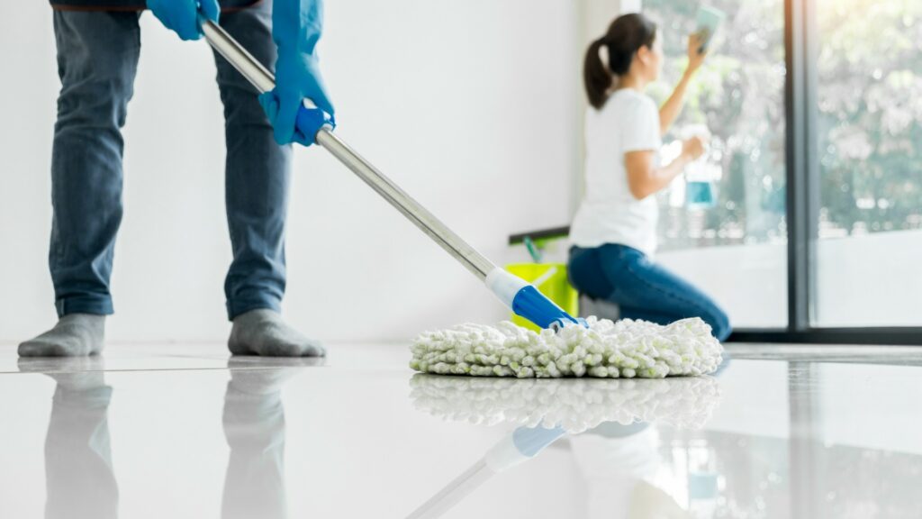 airbnb cleaning crewing mopping floors and cleaning windows