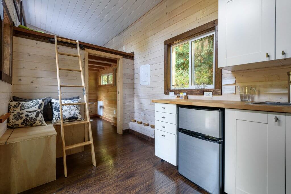 inside living room and kitchen of an airbnb tiny house