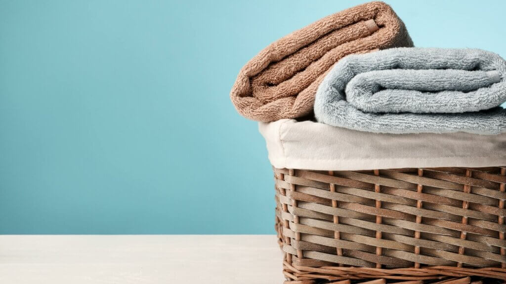 basket of towels for airbnb laundry